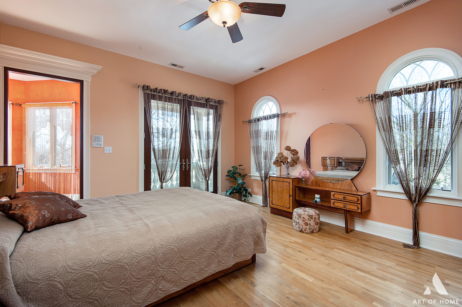 14940 El Greco Street Lemont, IL 60439 - Photo 34 of 67 a bedroom with a bed a desk and a chandelier