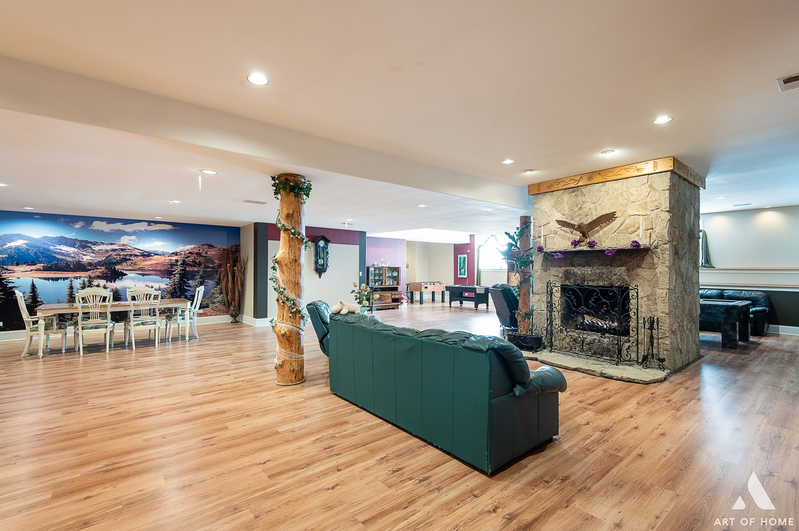 14940 El Greco Street Lemont, IL 60439 - Photo 45 of 67 a living room with furniture a fireplace and kitchen view