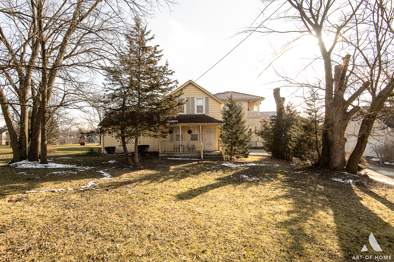 14940 El Greco Street Lemont, IL 60439 - Photo 63 of 67 a view of a white house with a snow on the road