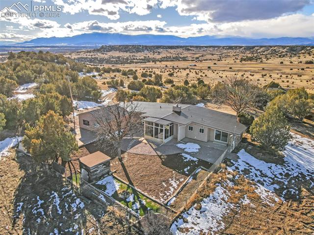 5835 Verde Road Pueblo, CO 81004 - Photo 45 of 50 Drone / aerial view with a mountain view