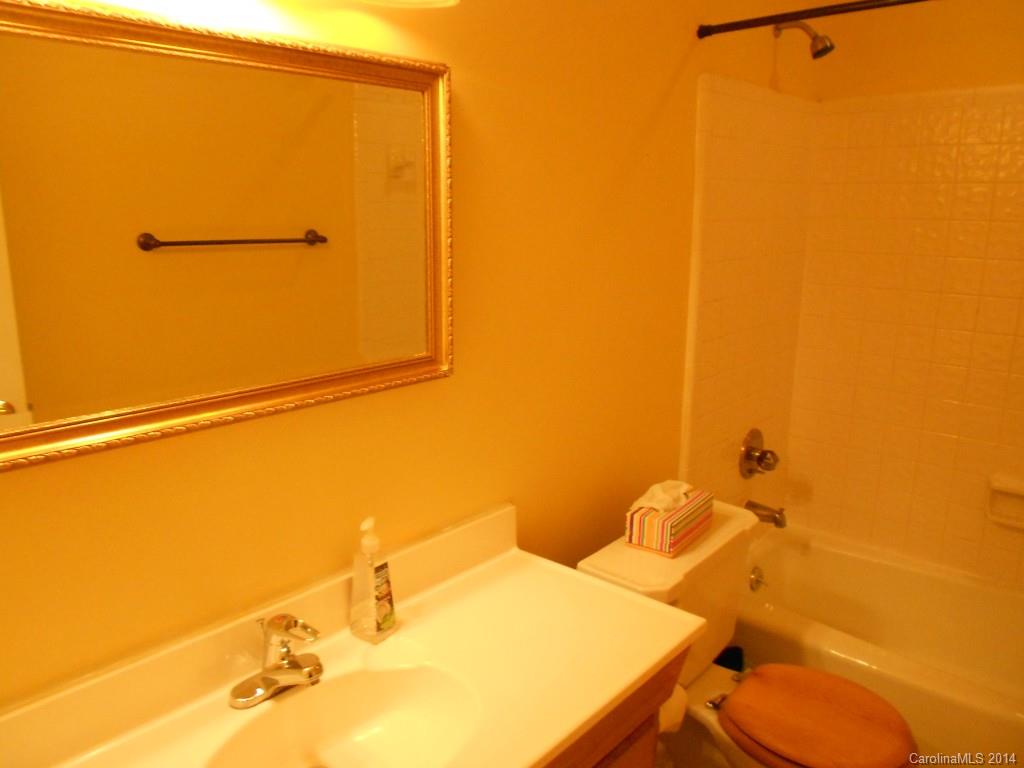 4135 Randolph Road, Unit 4 Charlotte, NC 28211 - Photo 16 of 22 a bathroom with a sink and a toilet