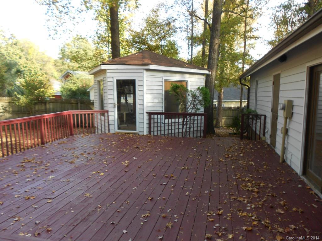 4135 Randolph Road, Unit 4 Charlotte, NC 28211 - Photo 20 of 22 a view of a house with a yard