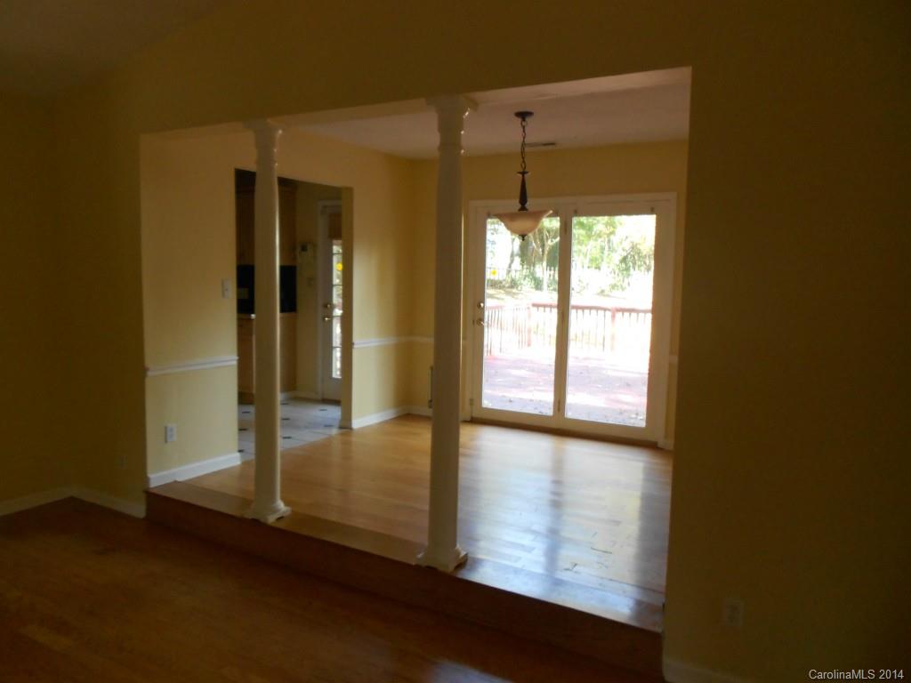 4135 Randolph Road, Unit 4 Charlotte, NC 28211 - Photo 5 of 22 a view of empty room with wooden floor and fan