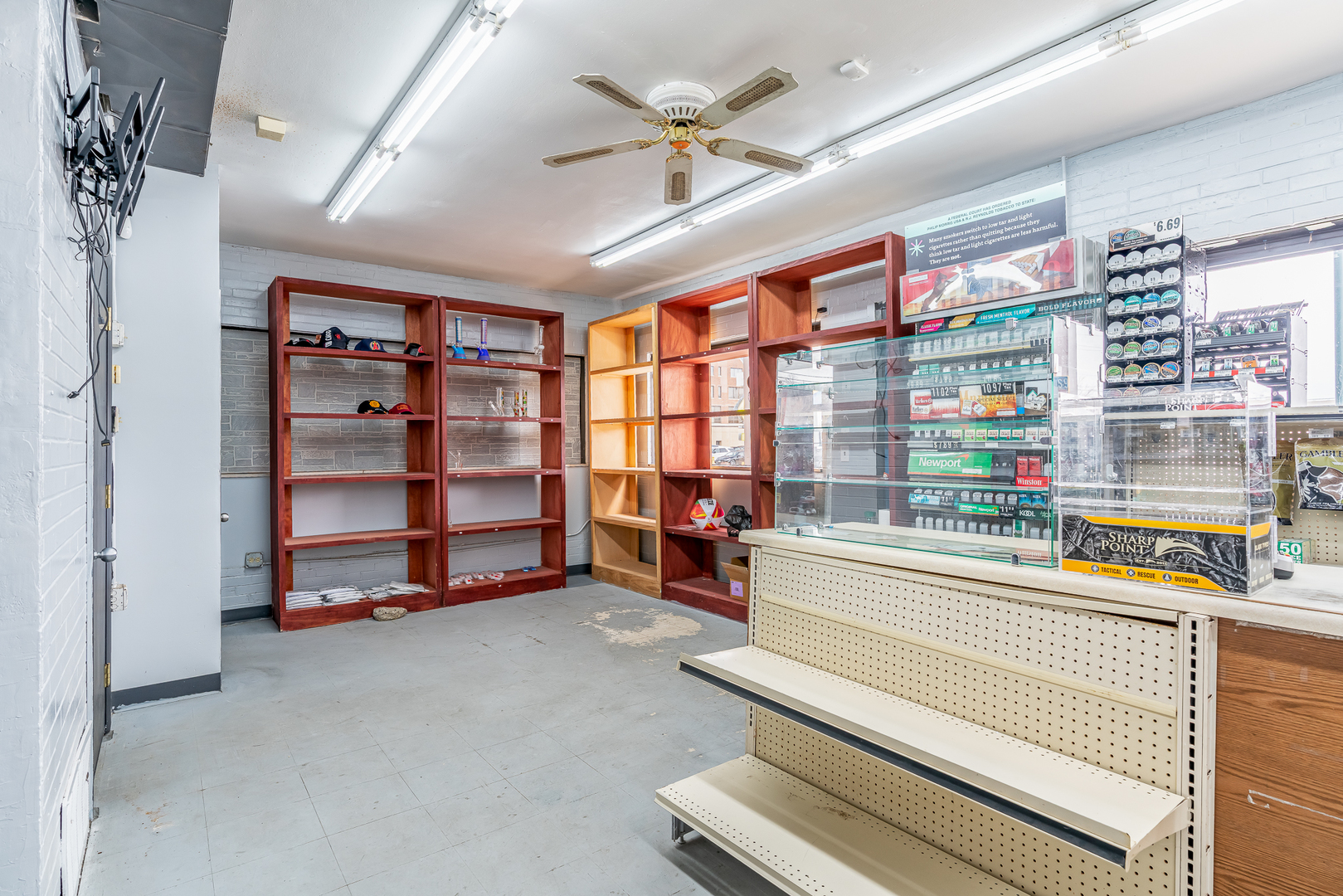 1830 5th Avenue Moline, IL 61265 - Photo 6 of 13 a living room with furniture and a flat screen tv