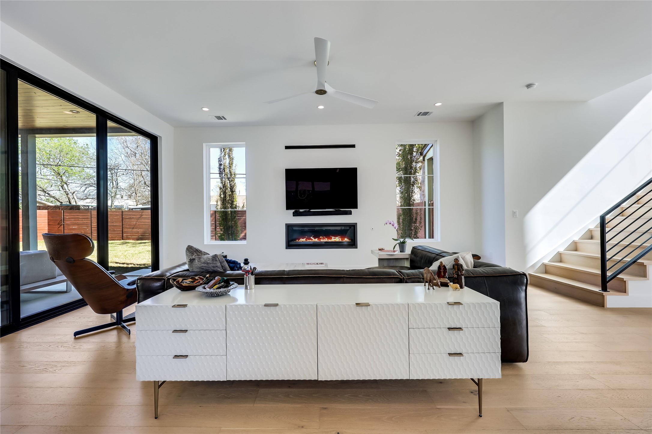 4600 Gillis Street Austin, TX 78745 - Photo 12 of 40 a living room with furniture and a flat screen tv