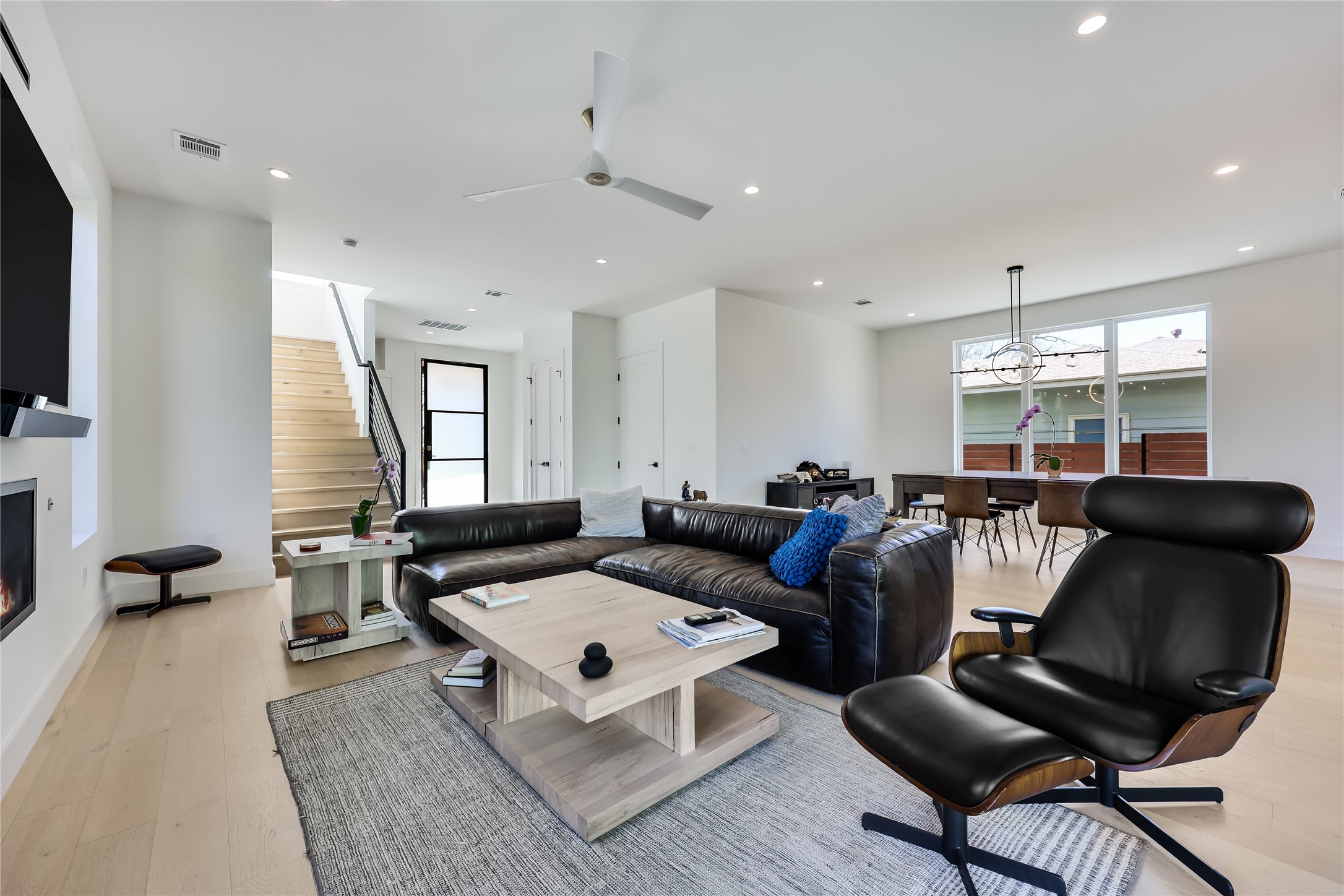 4600 Gillis Street Austin, TX 78745 - Photo 13 of 40 a living room with furniture and a flat screen tv