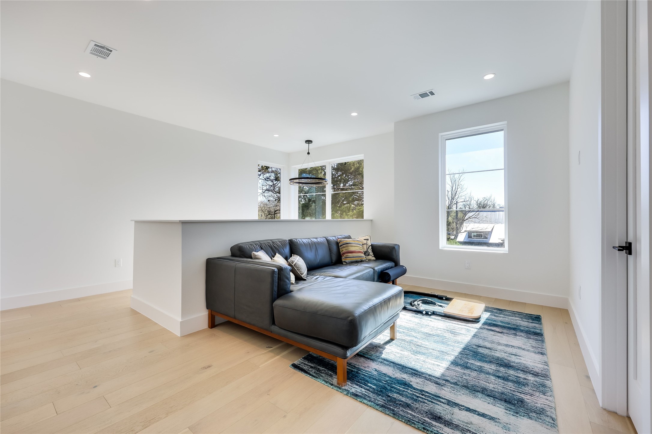 4600 Gillis Street Austin, TX 78745 - Photo 24 of 40 a living room with furniture and a window
