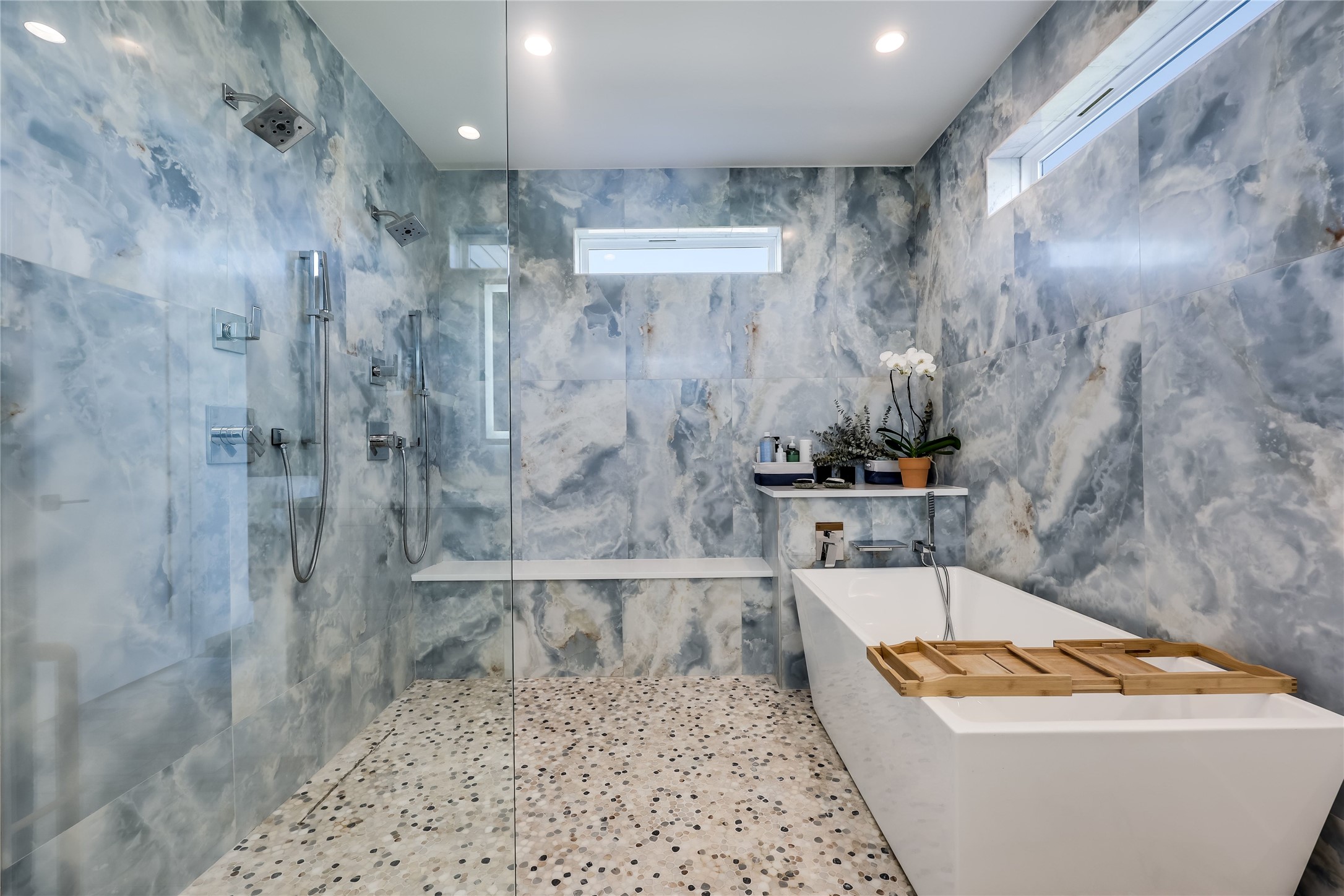 4600 Gillis Street Austin, TX 78745 - Photo 28 of 40 a bathroom with a bathtub and shower