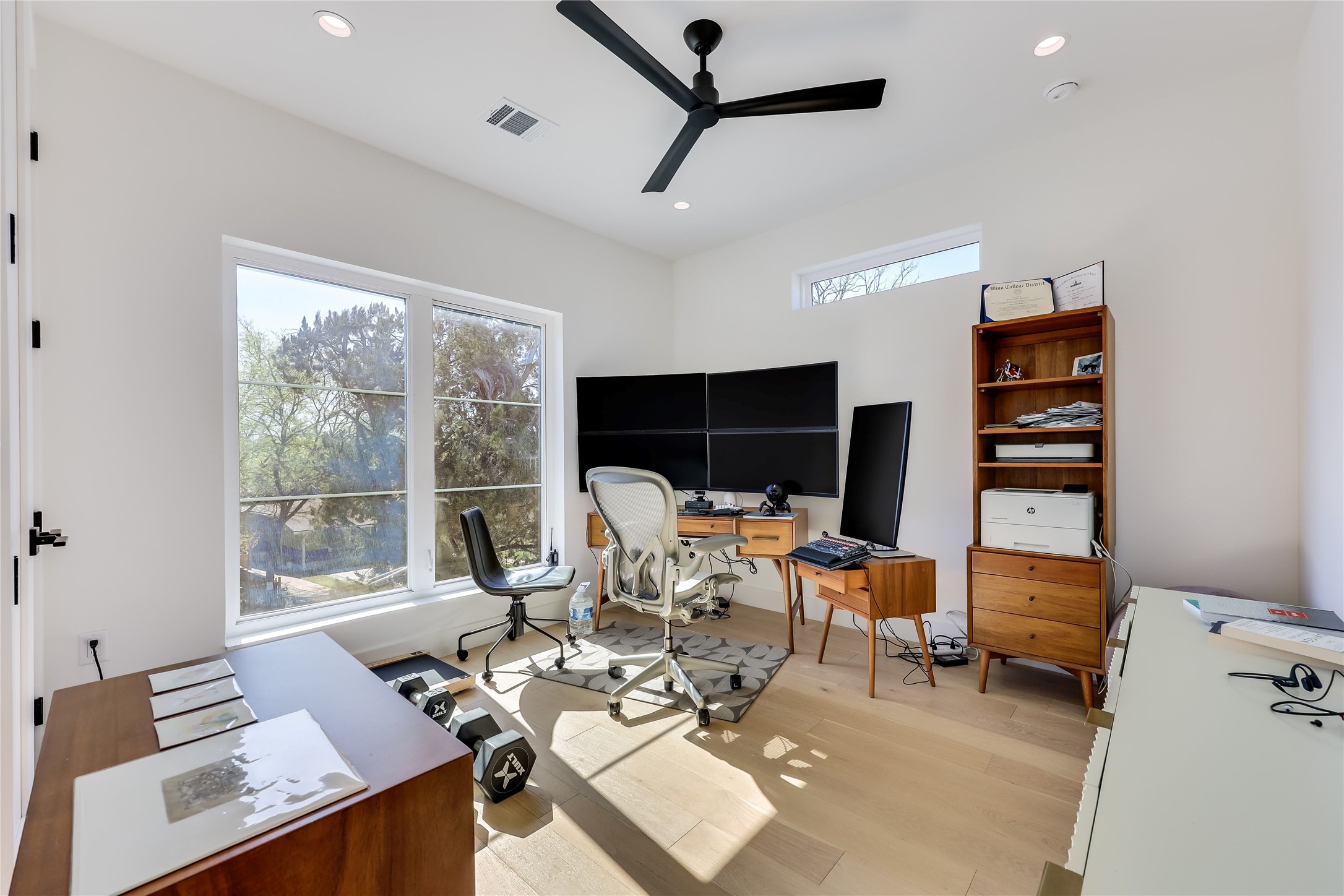 4600 Gillis Street Austin, TX 78745 - Photo 30 of 40 a living room with furniture and a flat screen tv