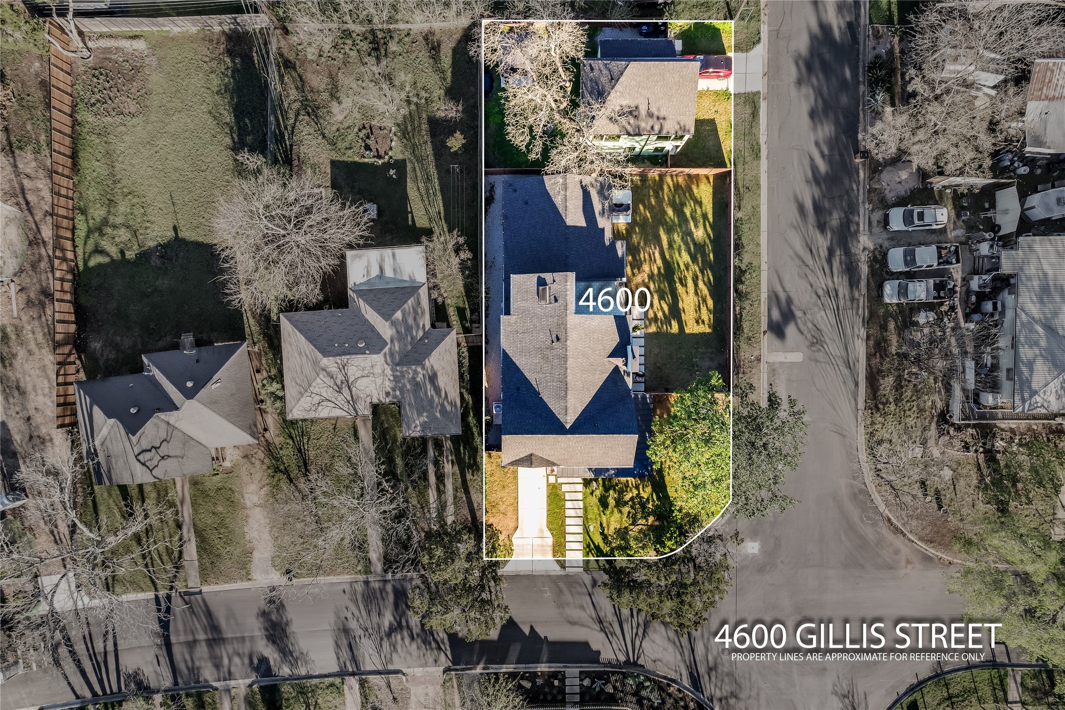4600 Gillis Street Austin, TX 78745 - Photo 37 of 40 an aerial view of a house with a yard and large trees