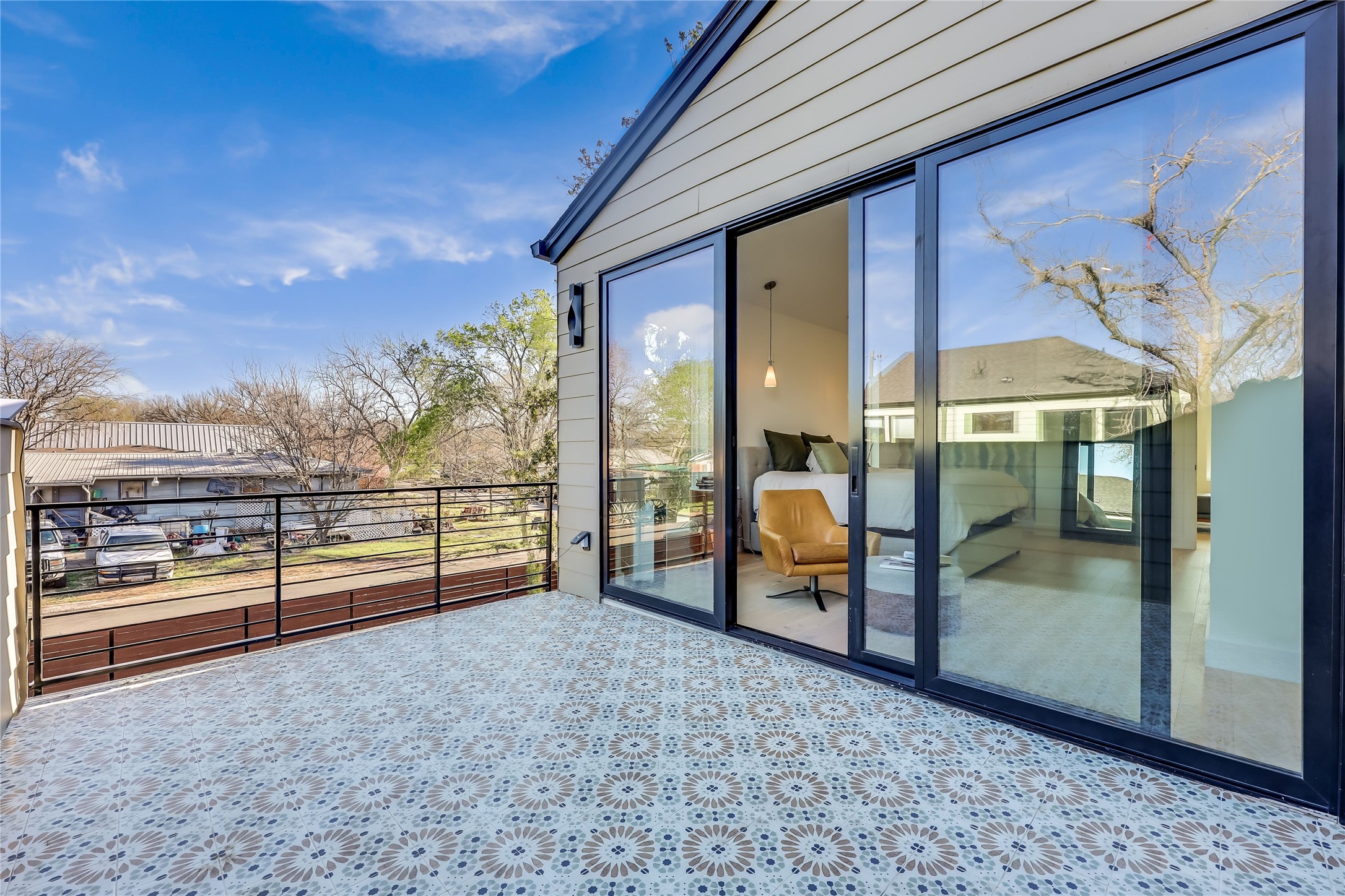 4600 Gillis Street Austin, TX 78745 - Photo 5 of 40 an empty room with sliding door and wooden floor