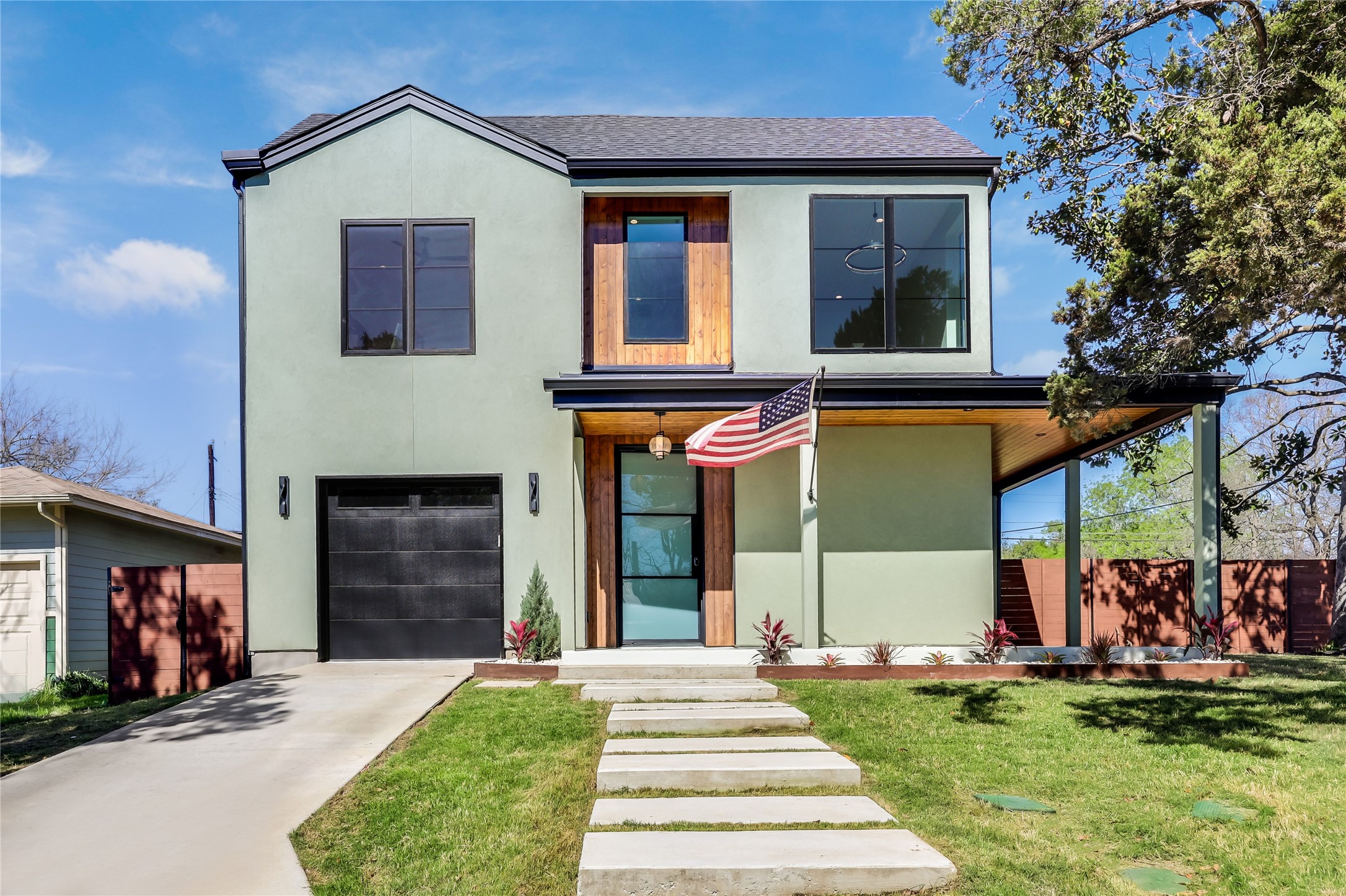4600 Gillis Street Austin, TX 78745 - Photo 8 of 40 a front view of a house with a yard