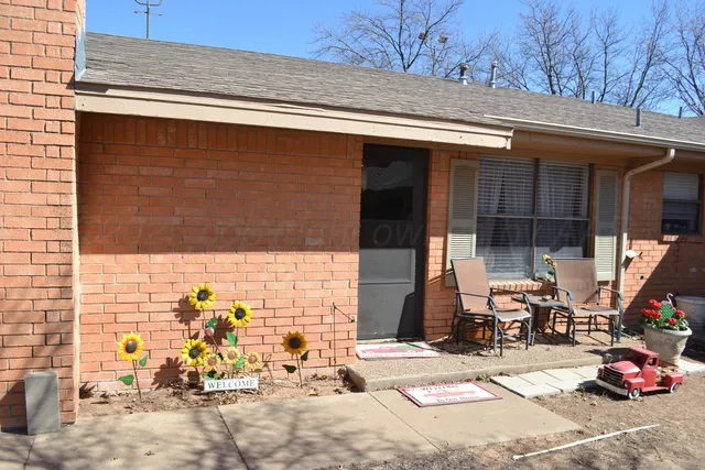 a view of parked car with garage