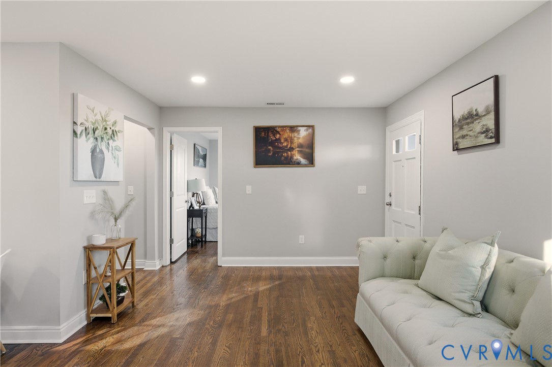 6280 Monahan Road Henrico, VA 23231 - Photo 13 of 42 a living room with furniture and a wooden floor