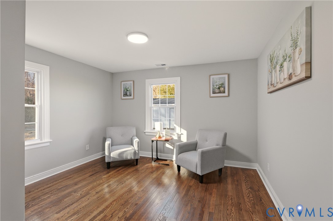 6280 Monahan Road Henrico, VA 23231 - Photo 28 of 42 a living room with furniture and a wooden floor