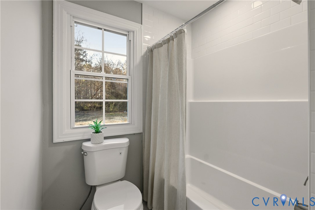 6280 Monahan Road Henrico, VA 23231 - Photo 34 of 42 a bathroom with a toilet and a shower