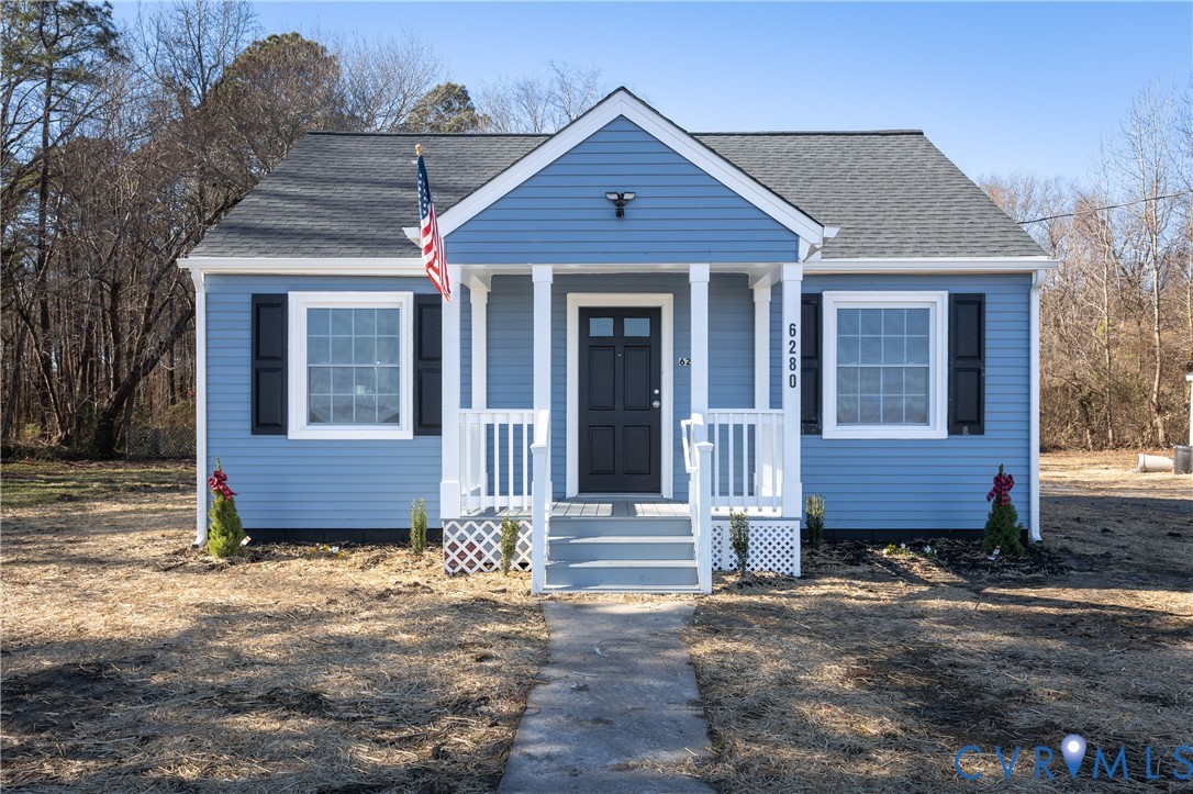 6280 Monahan Road Henrico, VA 23231 - Photo 5 of 42 a front view of a house with wooden fence