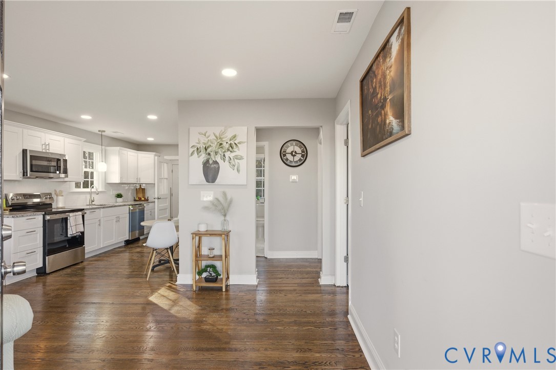 6280 Monahan Road Henrico, VA 23231 - Photo 8 of 42 a living room with stainless steel appliances furniture and a kitchen view