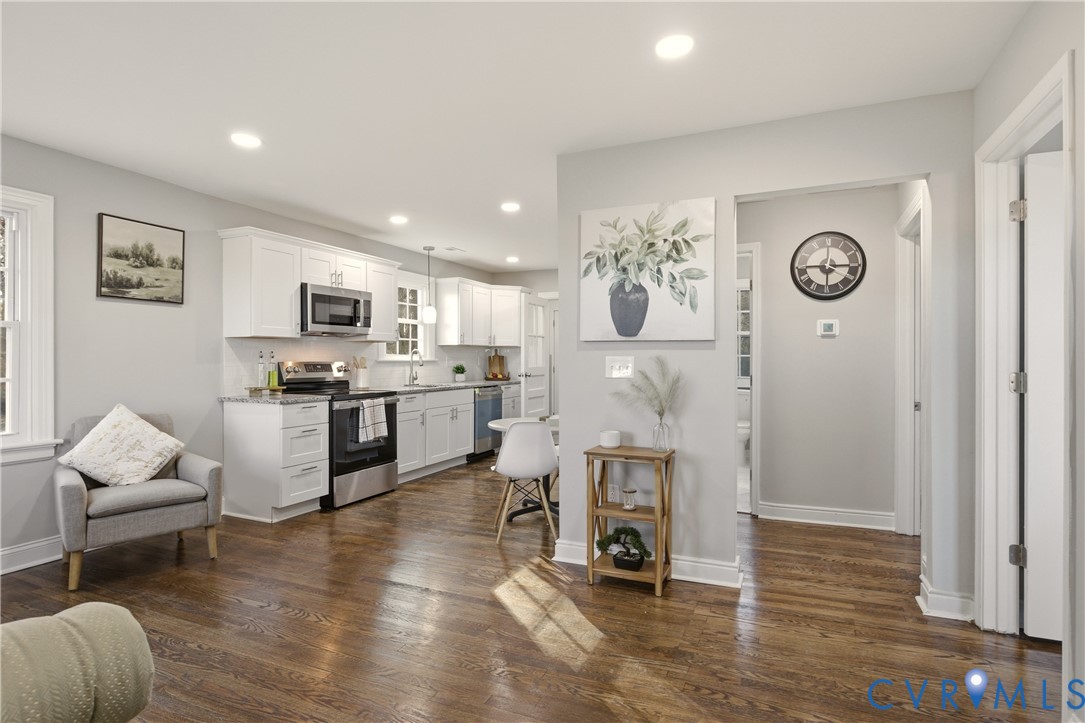6280 Monahan Road Henrico, VA 23231 - Photo 9 of 42 a living room with furniture and a fireplace
