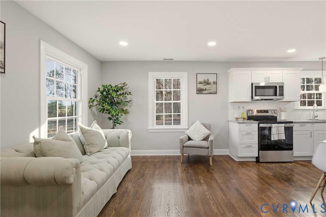 6280 Monahan Road Henrico, VA 23231 - Photo 10 of 42 a living room with furniture or couch and a wooden floor