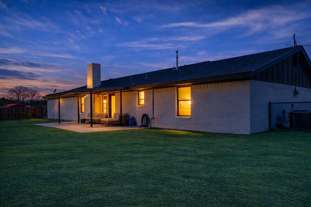 19 43040th Powderly, TX 75473 - Photo 6 of 21 a front view of a house with garden
