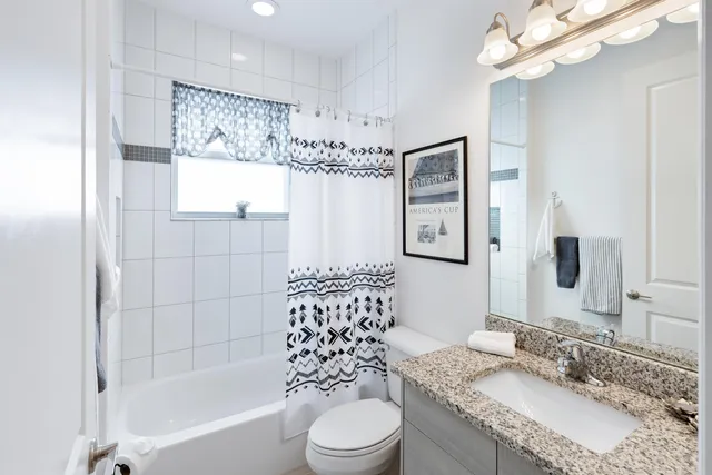 a kitchen with stainless steel appliances granite countertop lots of counter top space and furniture