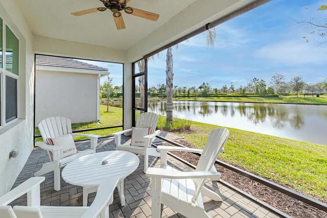 an aerial view of a house with a lake lake view