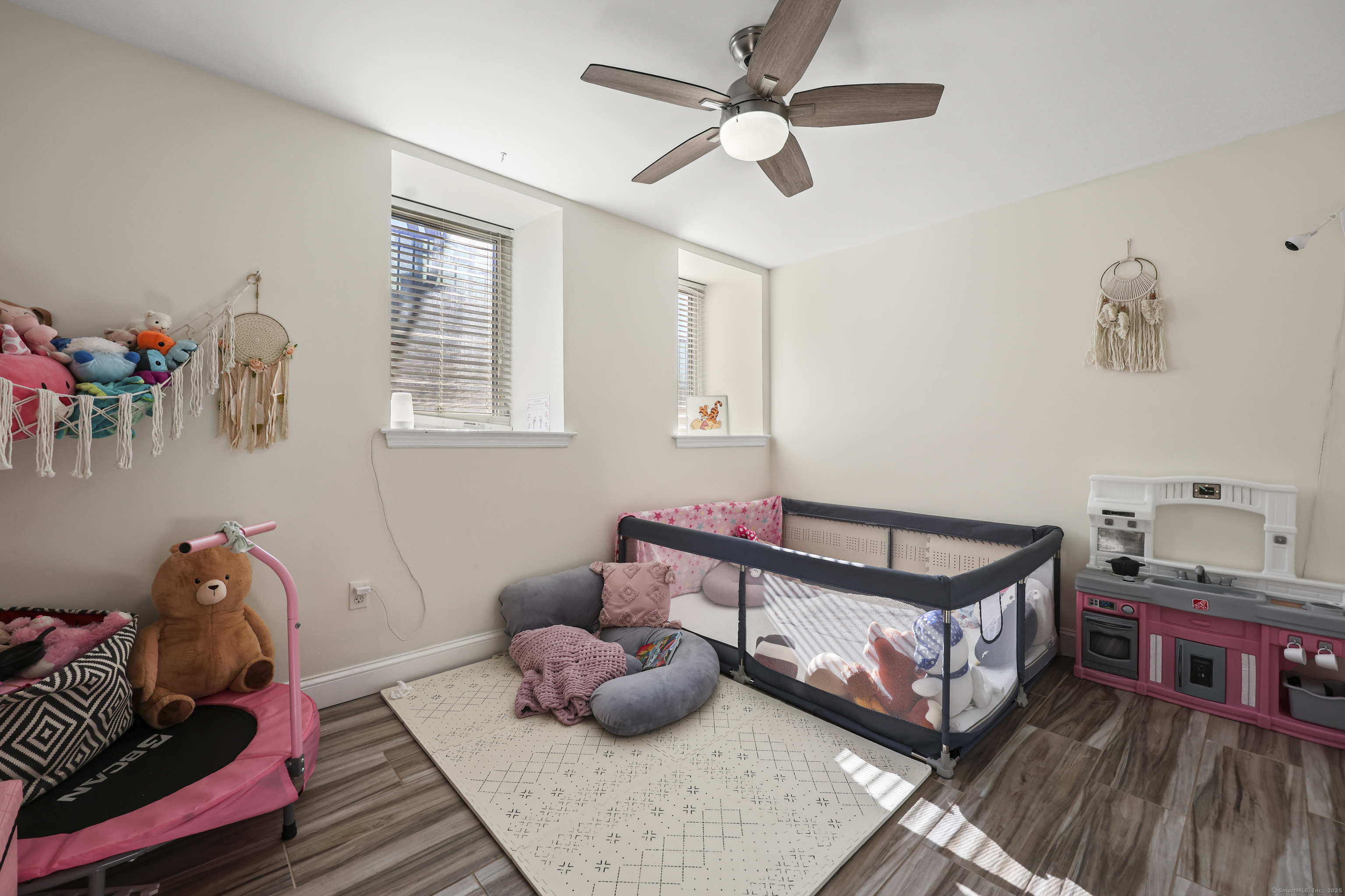 881 Lafayette Boulevard, Unit 1A Bridgeport, CT 06604 - Photo 19 of 37 a bedroom with furniture and a window