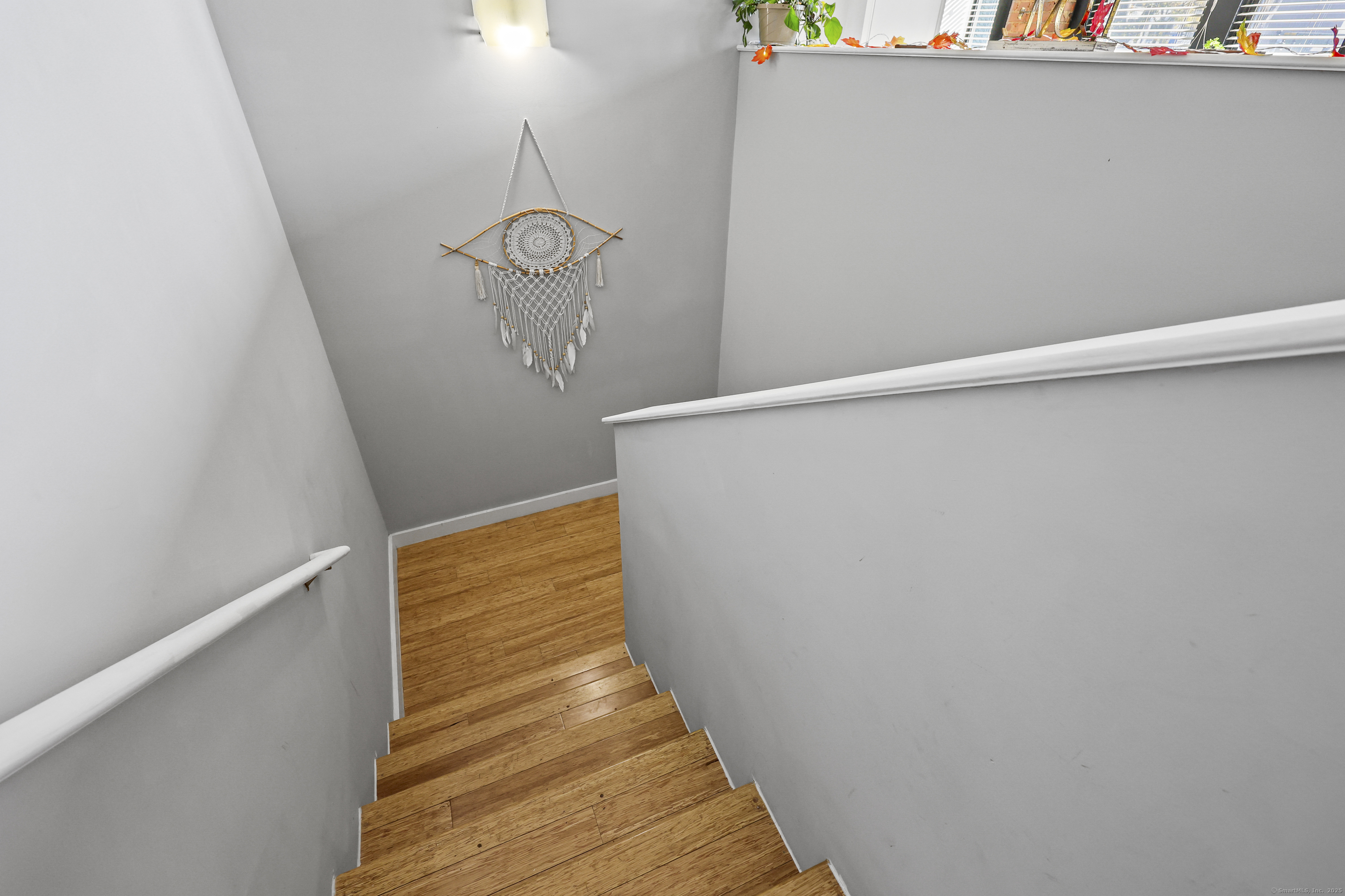 881 Lafayette Boulevard, Unit 1A Bridgeport, CT 06604 - Photo 20 of 37 a view of a room with racks on the wall