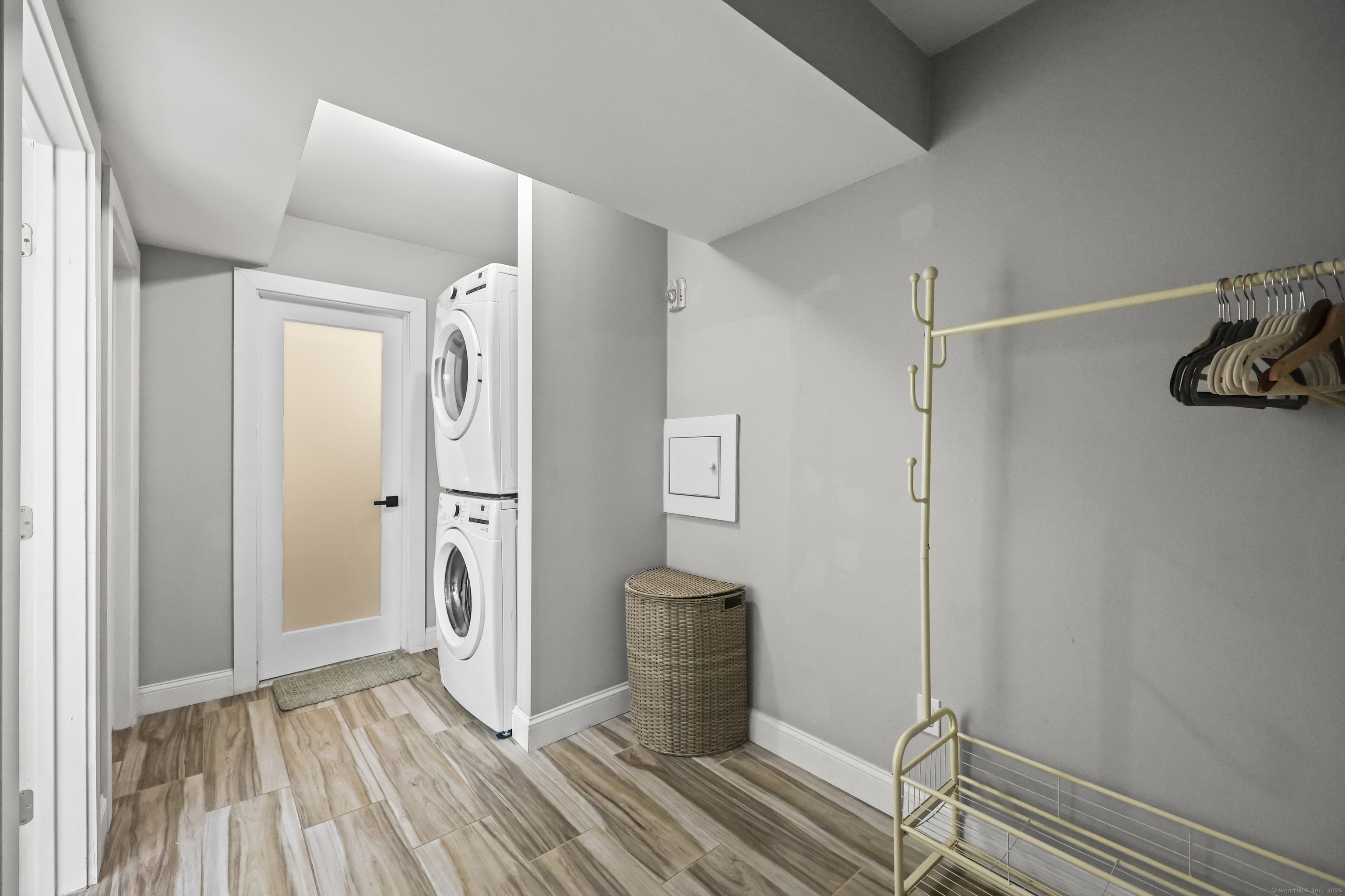 881 Lafayette Boulevard, Unit 1A Bridgeport, CT 06604 - Photo 28 of 37 a view of a hallway with wooden floor and closet