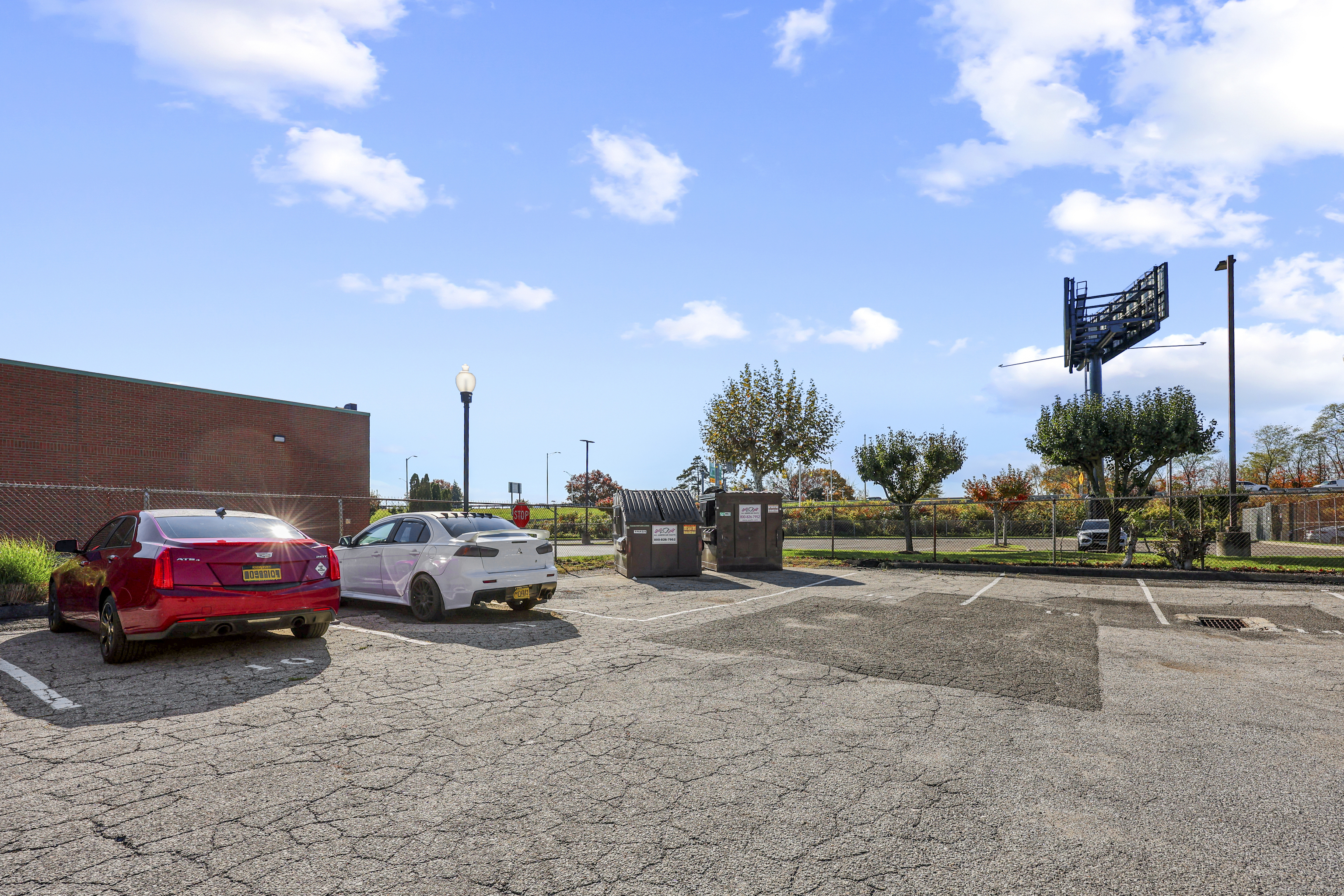 881 Lafayette Boulevard, Unit 1A Bridgeport, CT 06604 - Photo 37 of 37 a cars parked in a parking lot