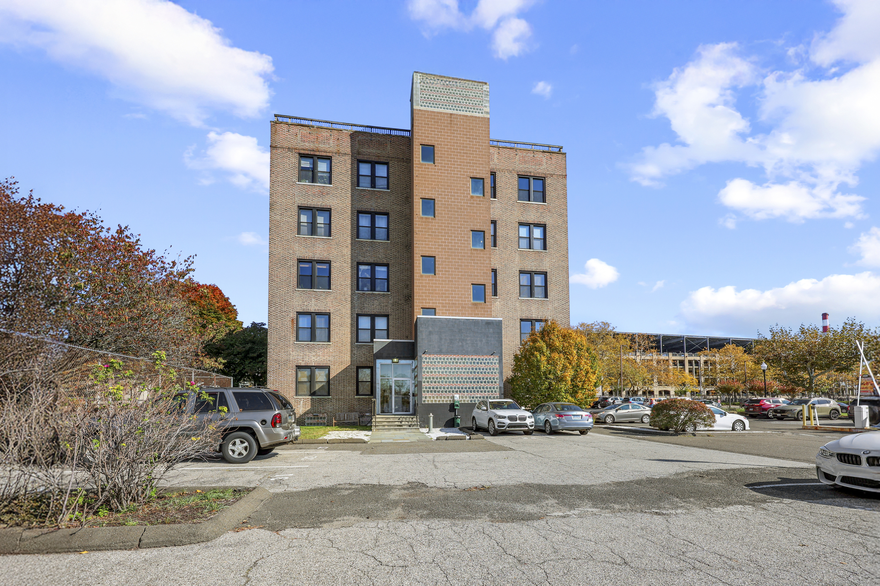 881 Lafayette Boulevard, Unit 1A Bridgeport, CT 06604 - Photo 6 of 37 a view of a building and car parked on the side of road