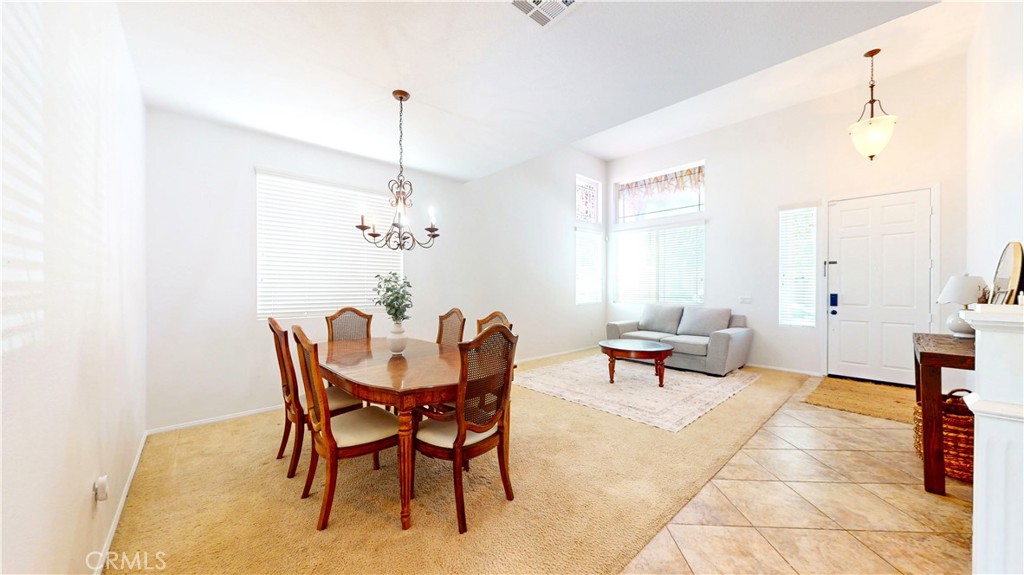 1279 Longbranch Road San Jacinto, CA 92582 - Photo 10 of 35 a dining room with furniture and window