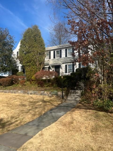 52 Laurel Place New Rochelle, NY 10801 - Photo 1 of 1 View of front of house featuring a front yard