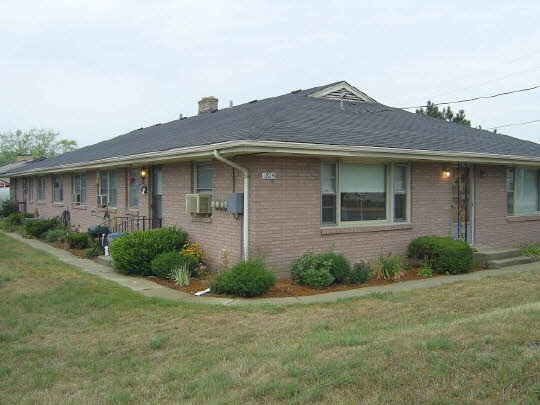 1805 South Alpine Road Rockford, IL 61108 - Photo 1 of 6 a front view of a house with garden