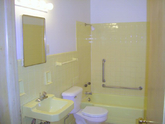 1805 South Alpine Road Rockford, IL 61108 - Photo 6 of 6 a bathroom with a sink a toilet and a mirror