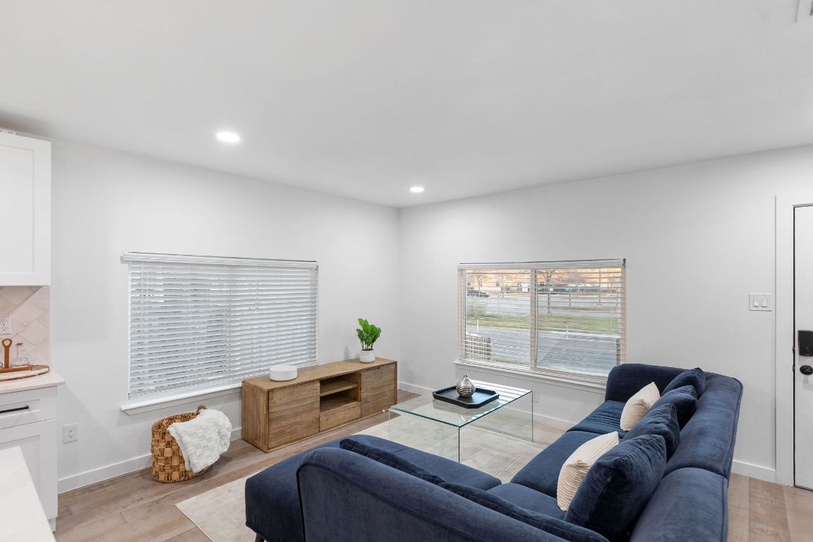 3004 Webberville Road, Unit 1 Austin, TX 78702 - Photo 4 of 12 a living room with furniture and a window