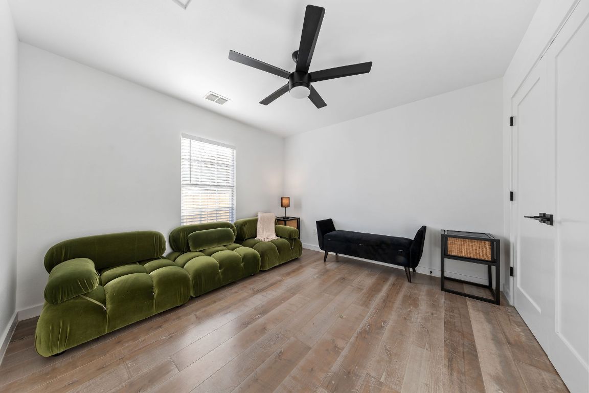 3004 Webberville Road, Unit 1 Austin, TX 78702 - Photo 9 of 12 a living room with furniture and a window