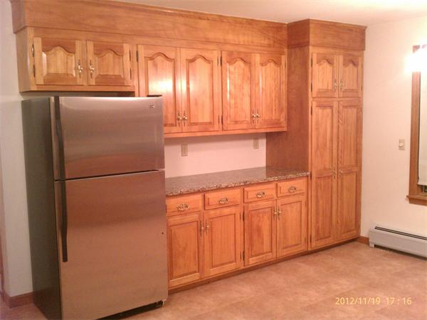 21 State Road Whately, MA 01373 - Photo 4 of 23 a kitchen with stainless steel appliances a refrigerator and cabinets