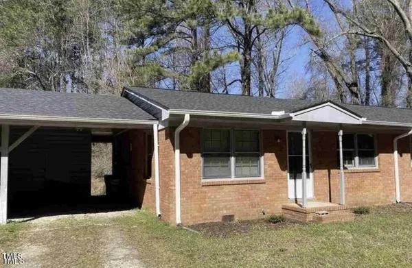 a front view of a house with a view of a house