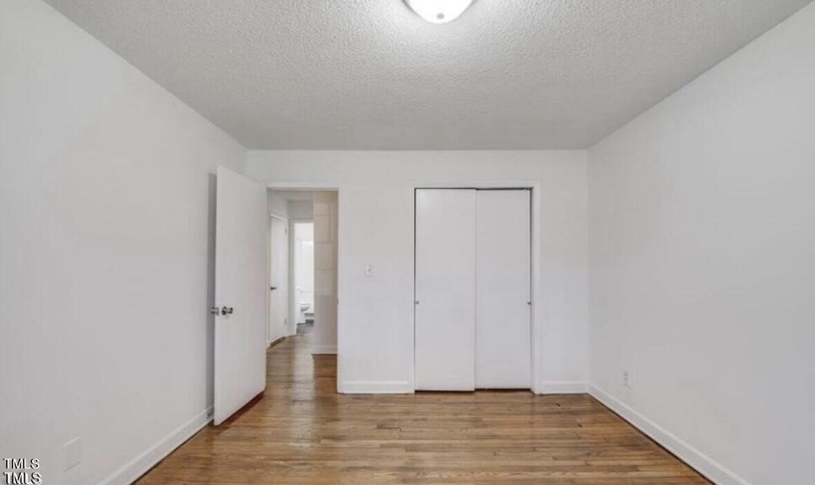 626 Maple Lane Raleigh, NC 27603 - Photo 6 of 8 a view of an empty room