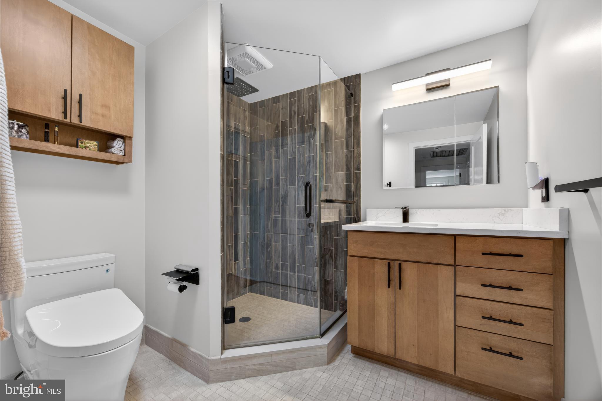 26 Mercer Avenue Doylestown, PA 18901 - Photo 15 of 24 a bathroom with a bathtub shower sink mirror and toilet