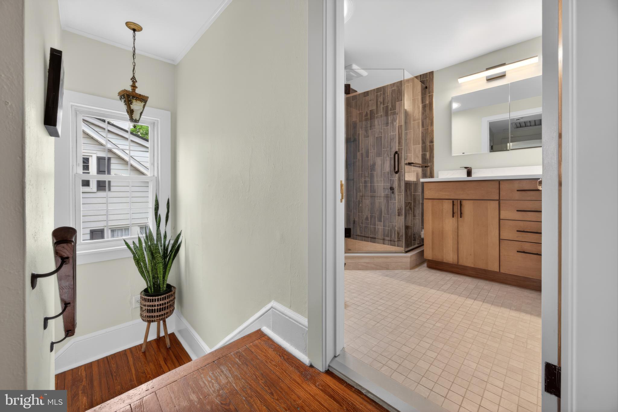 26 Mercer Avenue Doylestown, PA 18901 - Photo 16 of 24 a view of a kitchen and an entryway with wooden floor