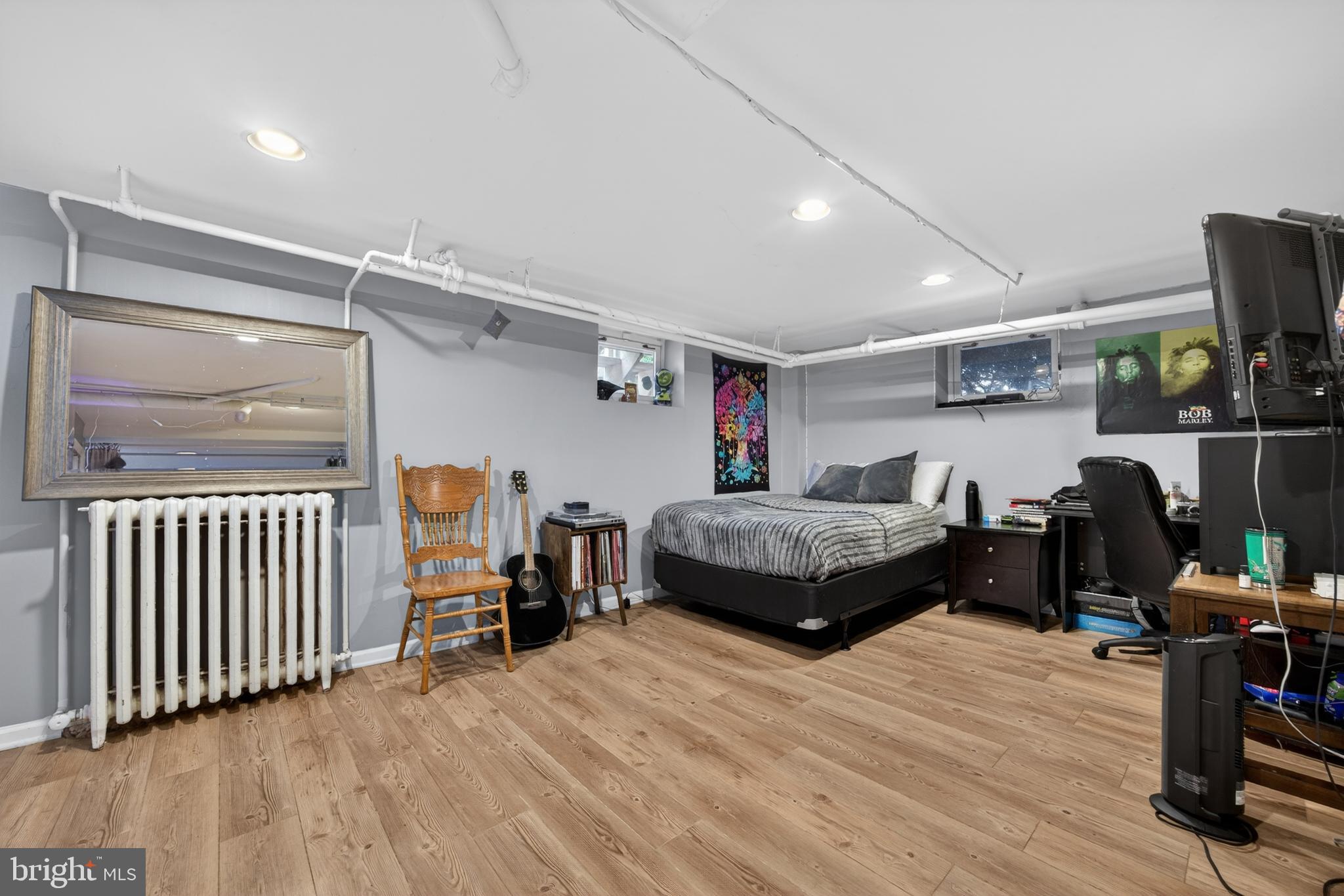26 Mercer Avenue Doylestown, PA 18901 - Photo 20 of 24 a bedroom with a bed and wooden floor