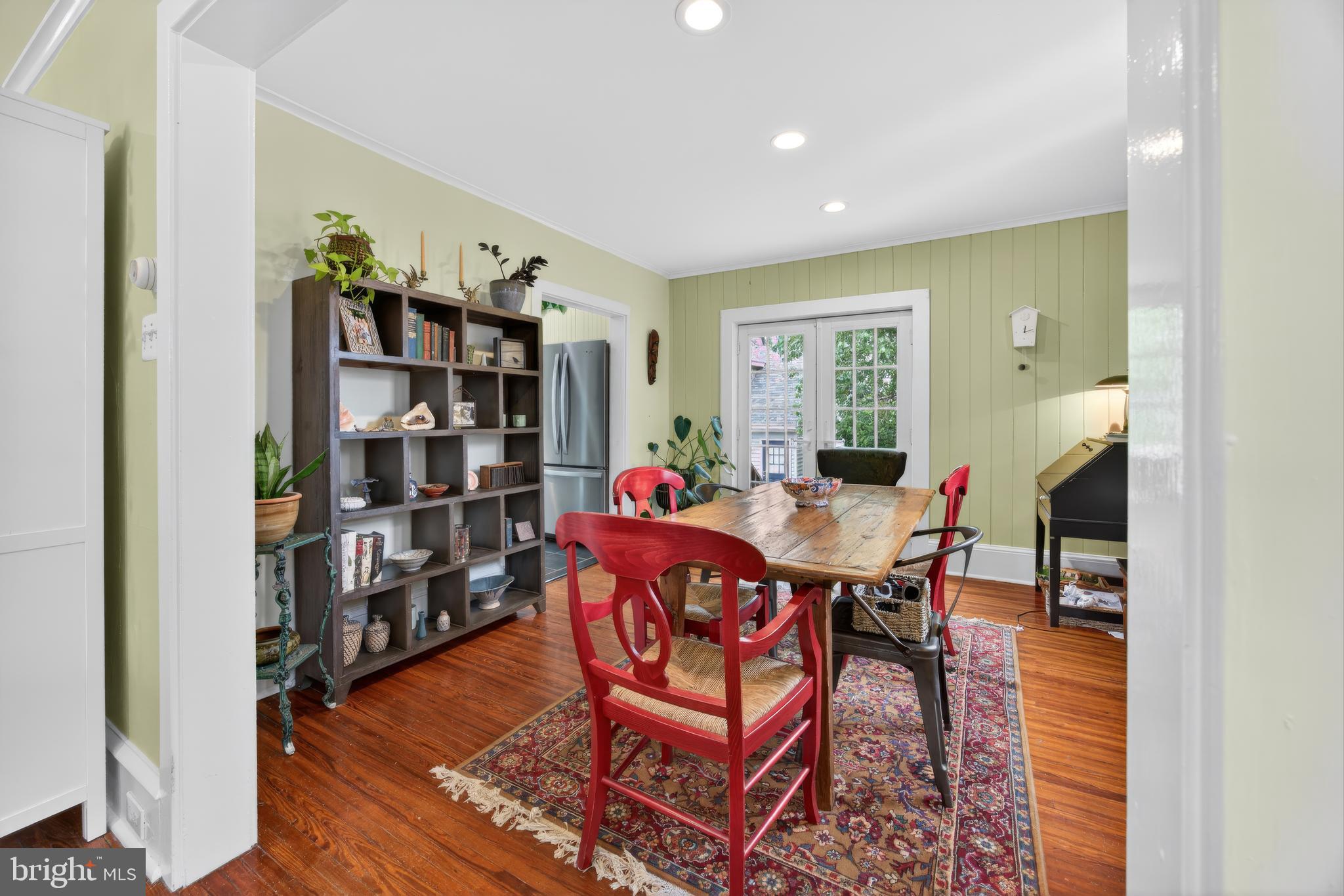 26 Mercer Avenue Doylestown, PA 18901 - Photo 7 of 24 a living room with furniture a rug and a bookshelf