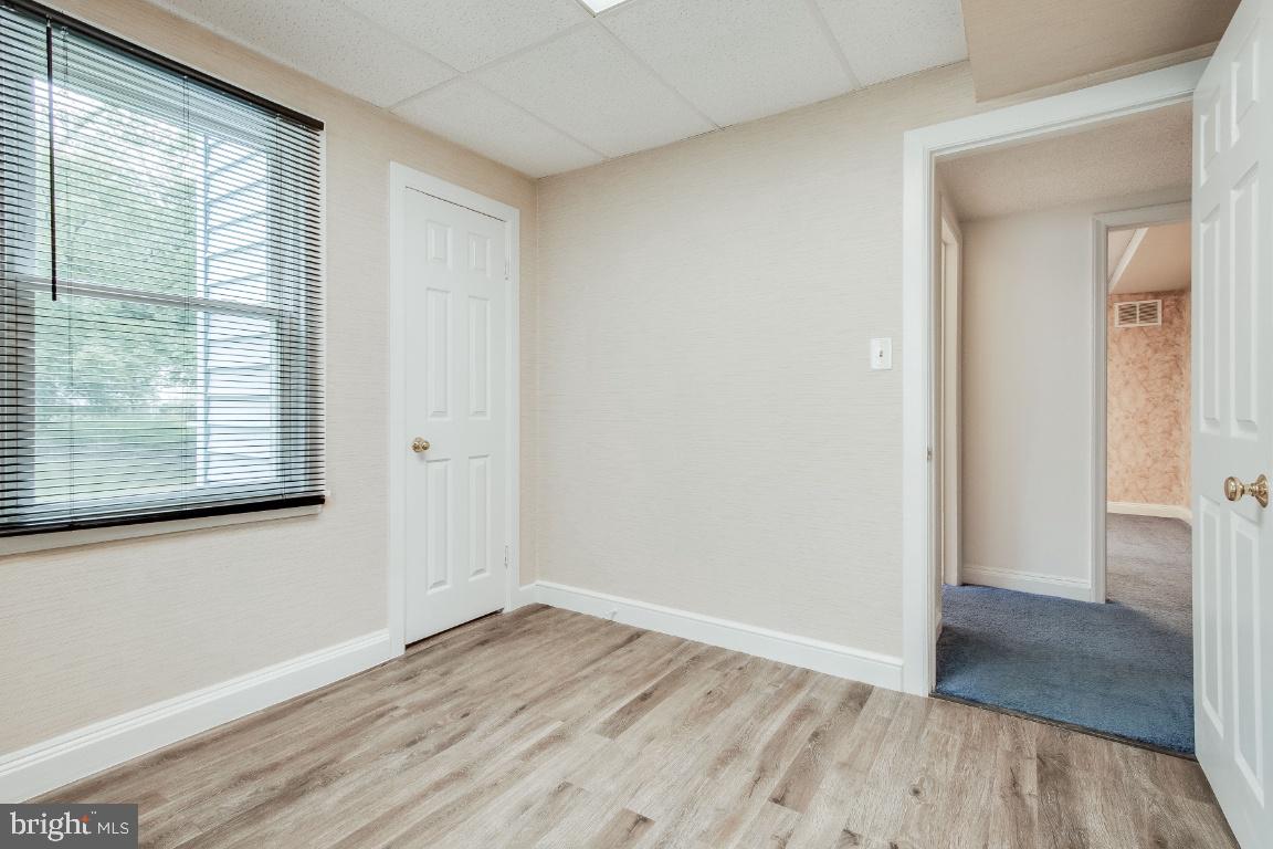 6301 Woodland Road Morningside, MD 20746 - Photo 17 of 32 Lower level bedroom #2 facing hallway