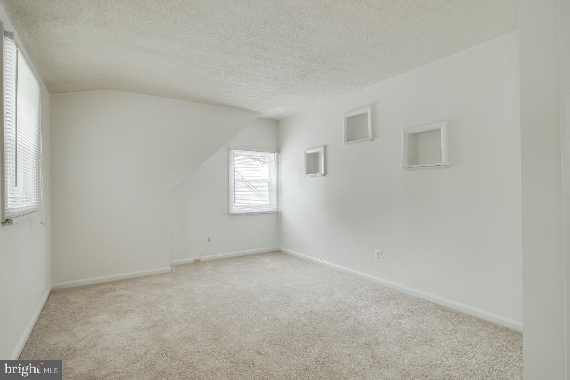 6301 Woodland Road Morningside, MD 20746 - Photo 19 of 32 Upper level bedroom #3 with built-in niches