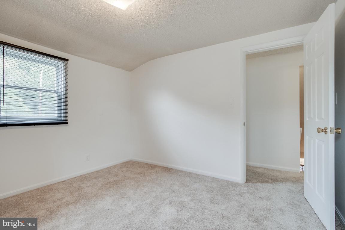 6301 Woodland Road Morningside, MD 20746 - Photo 22 of 32 Upper level bedroom #4 facing hallway