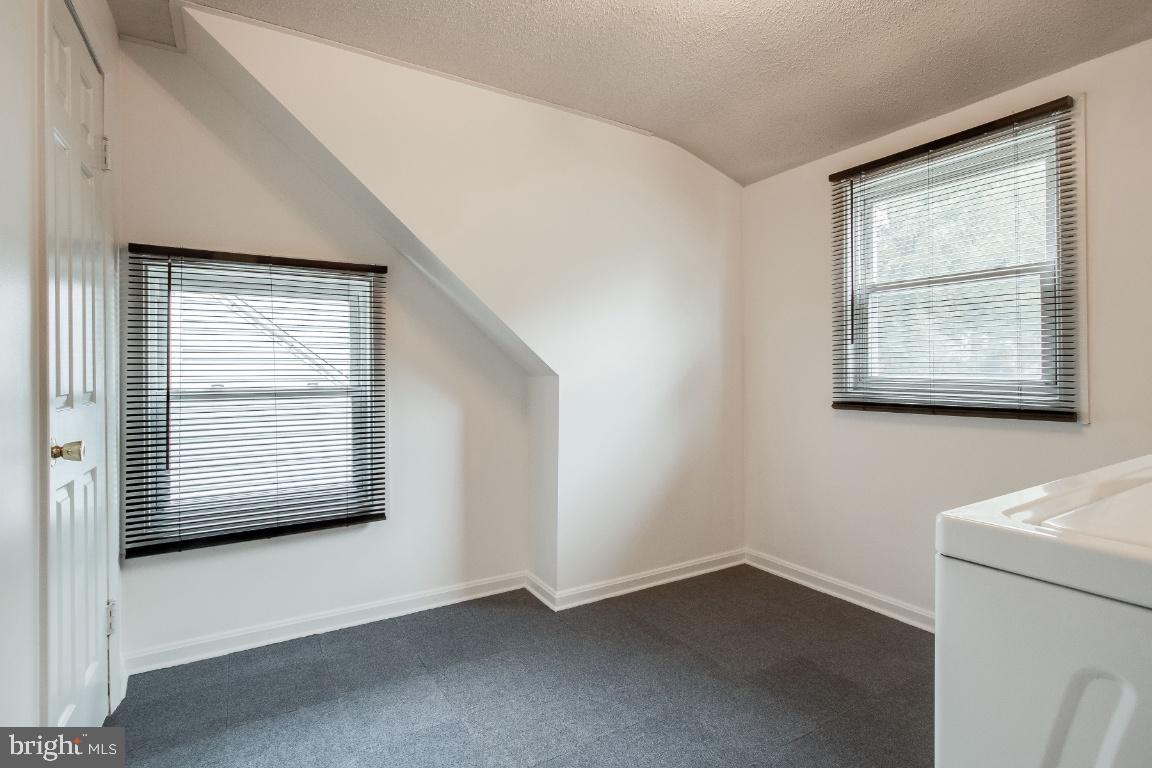 6301 Woodland Road Morningside, MD 20746 - Photo 26 of 32 Upper level spacious laundry room