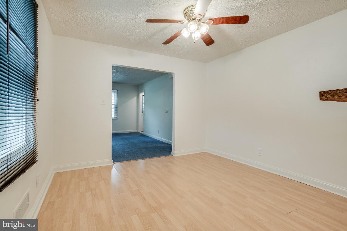 6301 Woodland Road Morningside, MD 20746 - Photo 9 of 32 Dining room facing the living room